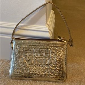 Coach gold wristlet